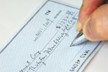 Should a person write a check to themselves to transfer money from one bank to another?